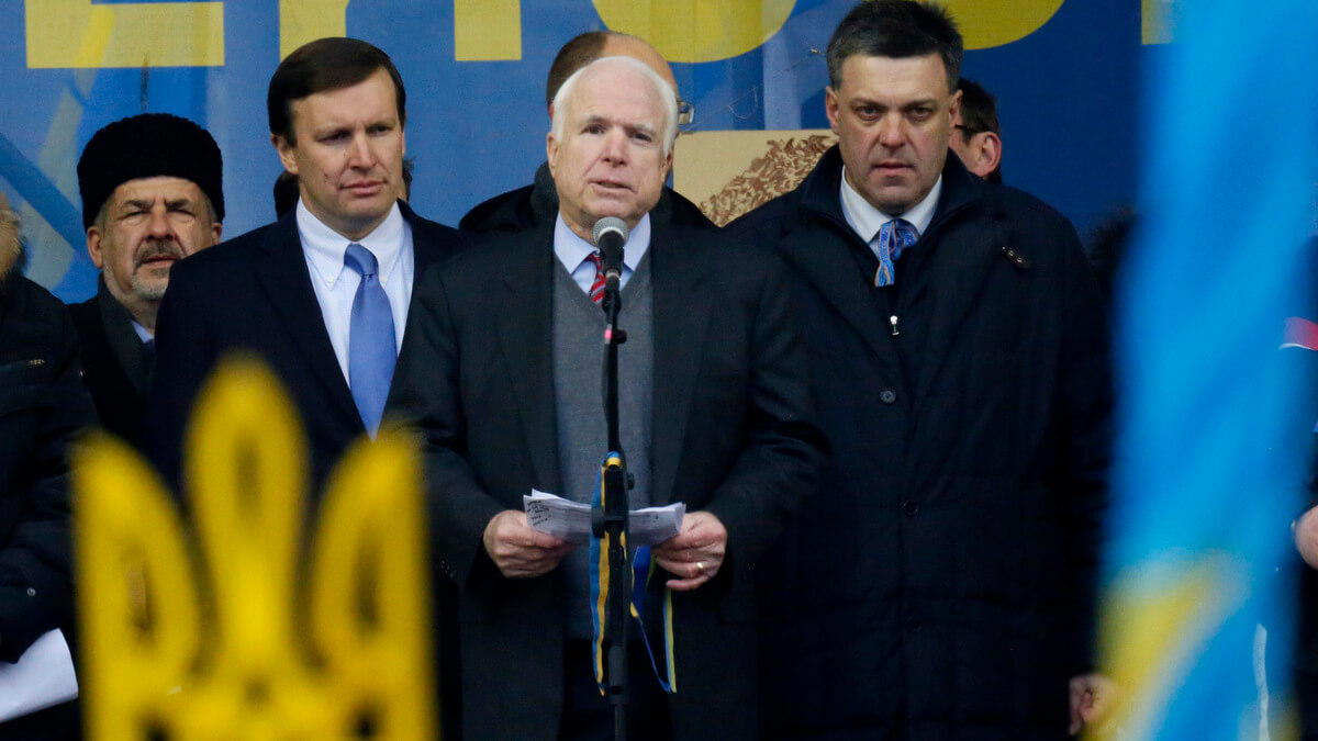 John McCain at a rally with Oleh Tyahnybok, leader of the far-right wing nationalist party Svoboda in Kiev, Ukraine, Dec. 15, 2013. Dmitry Lovetsky | AP