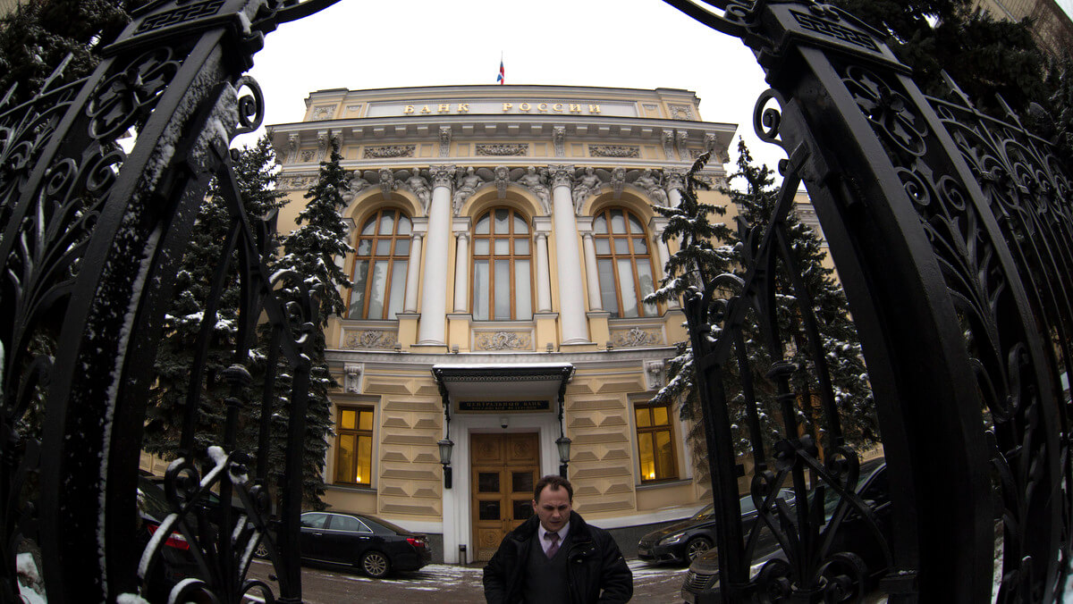A man walks in front of Russia's Central Bank building in Moscow, Russia, Jan. 30, 2015. Alexander Zemlianichenko | AP