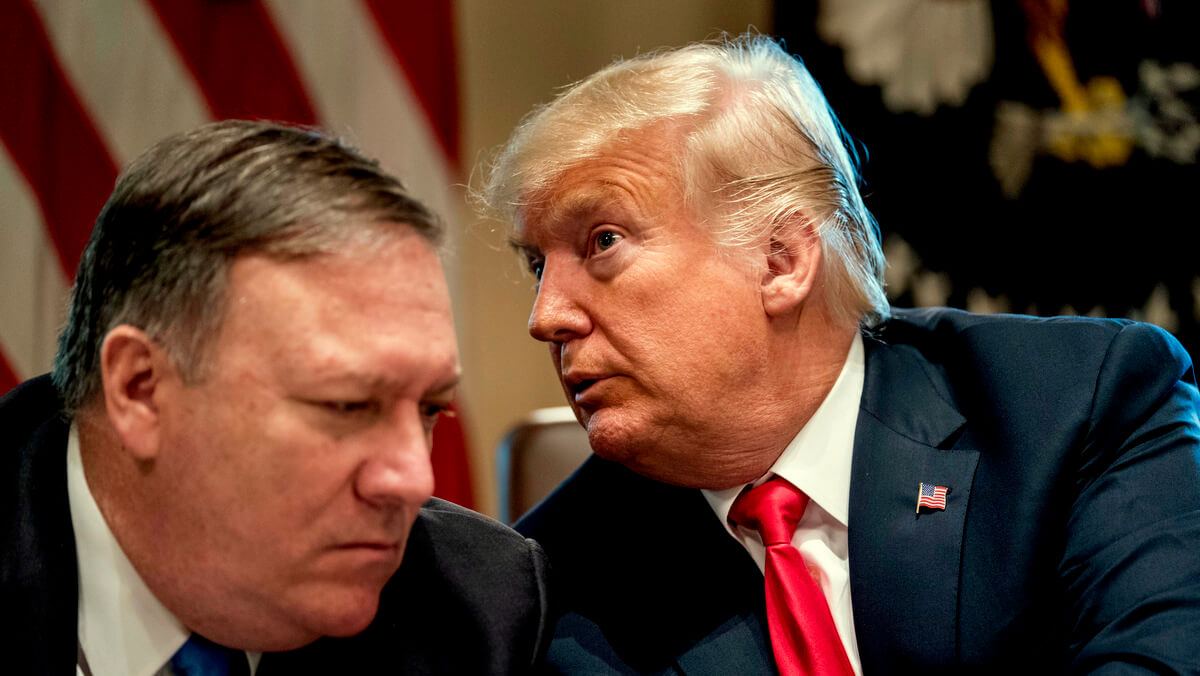 President Donald Trump talks with Secretary of State Mike Pompeo, left, during a cabinet meeting in the Cabinet Room of the White House, Aug. 16, 2018, in Washington. Andrew Harnik | AP