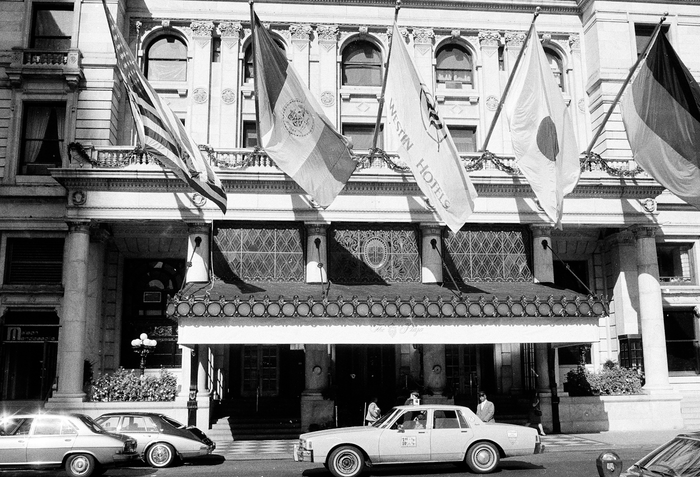Flags fly over the main entrance of the Plaza Hotel in New York City in 1982. Suzanne Vlamis | AP