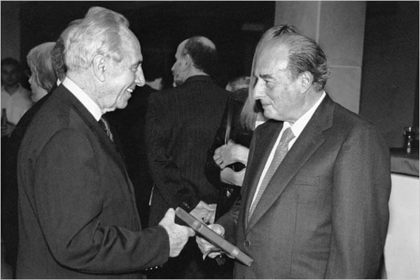 Marc Rich, right, is pictured with Israel’s Shimon Peres in a photo from Mark Daneil Ammann’s “The King of Oil.”