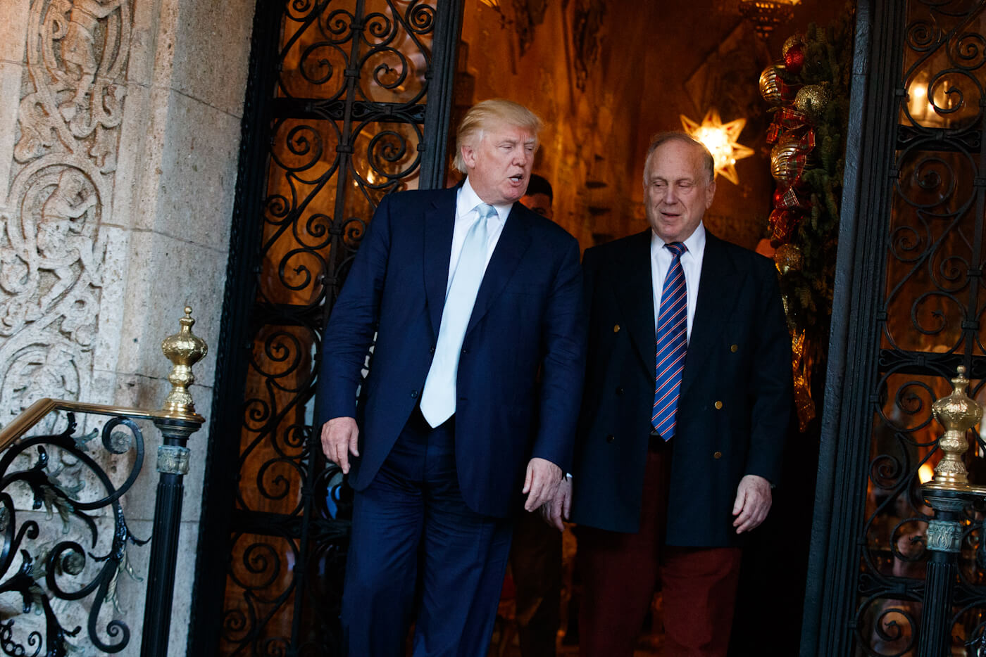President-elect Trump walks with Ronald Lauder after meeting at Mar-a-Lago, Dec. 28, 2016, in Palm Beach, Fla. Evan Vucci | AP