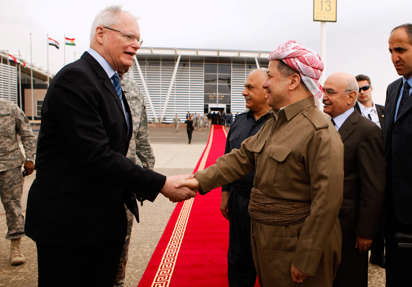 James Jeffrey, left, meets with Kurdish Regional Government President Massoud Barzani, April 8, 2011, at an airport in Irbil, Iraq. Chip Somodevilla | AP
