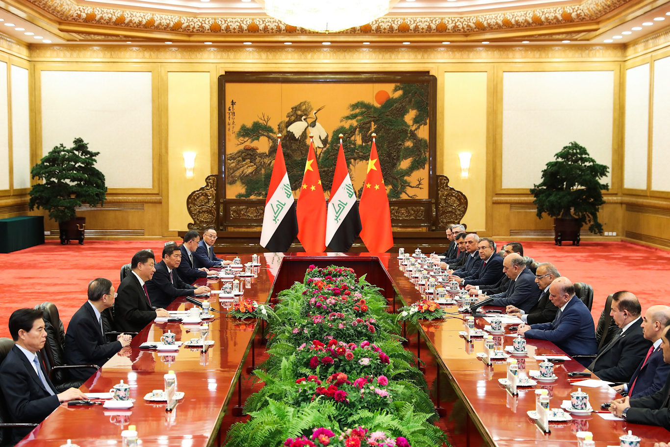 Chinese President Xi Jinping, center left, meet with Iraqi Prime Minister Adil Abdul-Mahdi, center right, in Beijing, Sept. 23, 2019. Lintao Zhang | AP