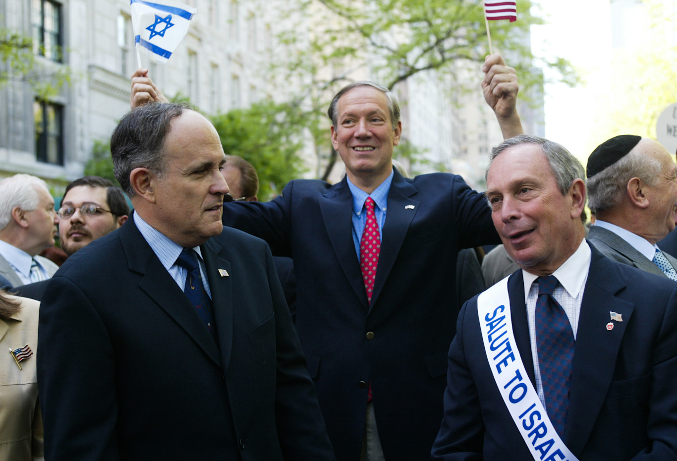 Rudy Giuliani, left, New York Gov. George Pataki, center, and Mike Bloomberg during a “Salute to Israel Parade, May 5, 2002, in New York. Shawn Baldwin | AP