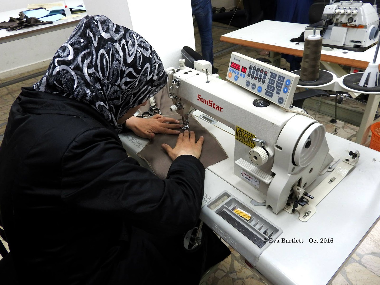 Learning sewing skills at the Barzeh Community Centre, October 2016. Photo | Eva Bartlett