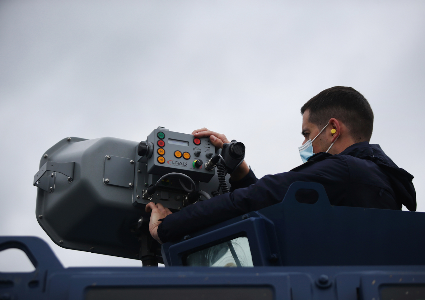  EU police officer deploys an LRAD