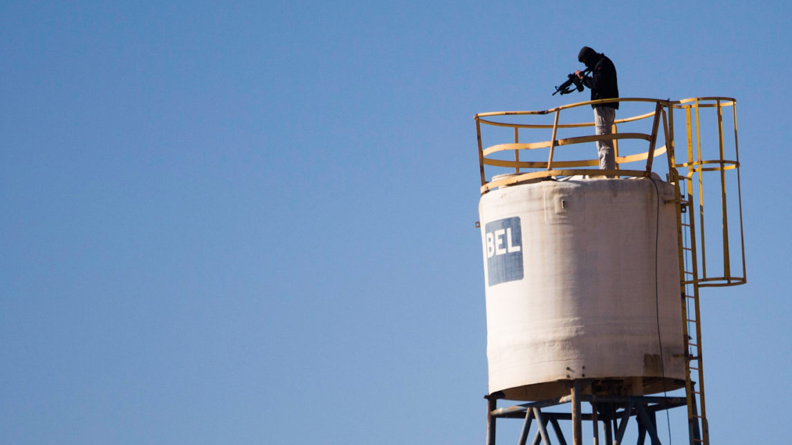 Privatizing the Occupation: How Israeli Corporations Came to Police the Palestinians