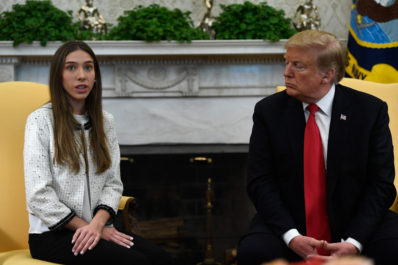 Trump, right, meets with Fabiana Rosales, left, wife of Juan Guaido in the Oval Office, March 27, 2019. Photo: Susan Walsh/AP