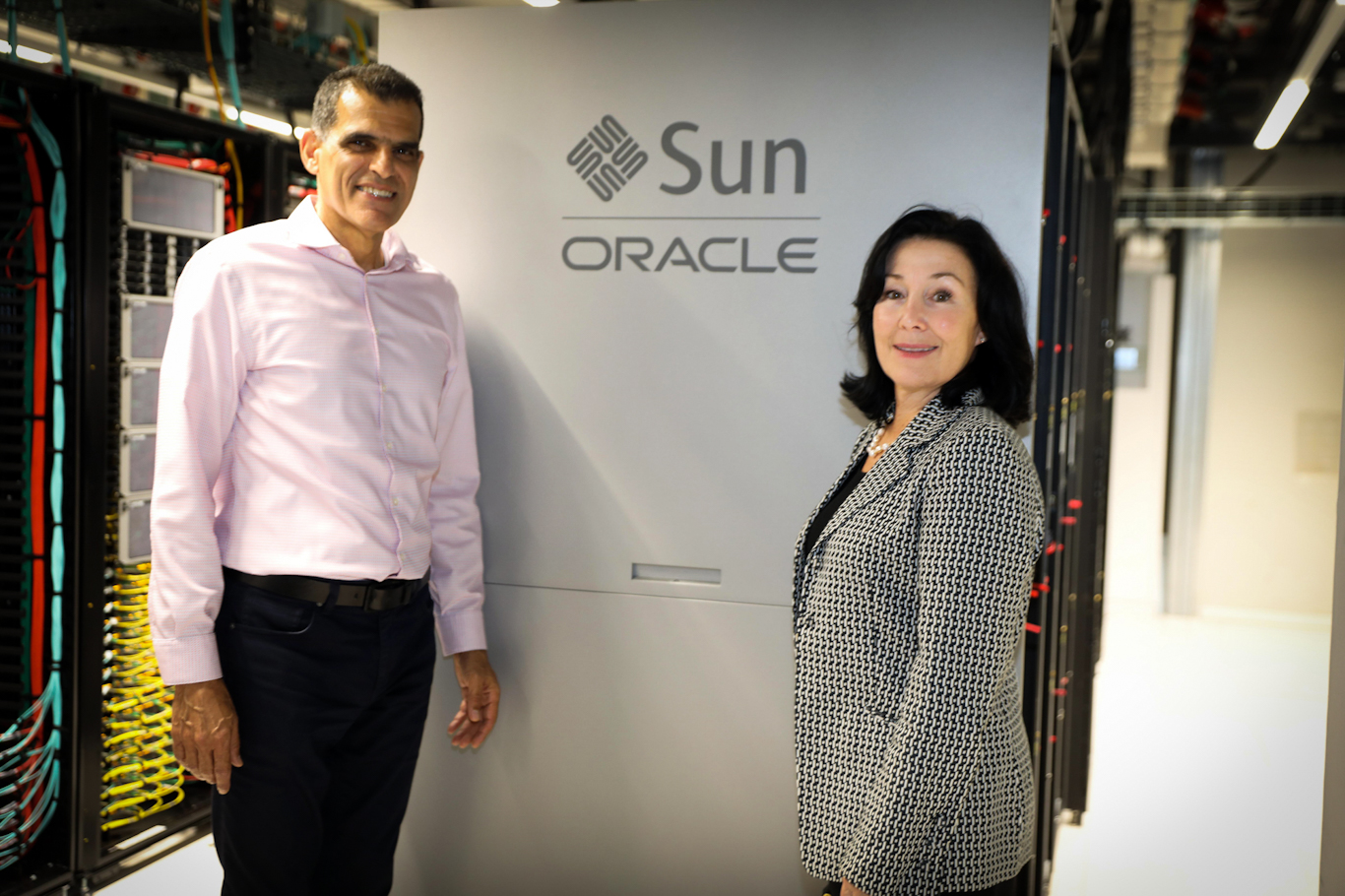 Safra Catz, Oracle’s CEO, poses with Alon Ben (left), CEO of Tel-Aviv-based Oracle data partner, Bynet