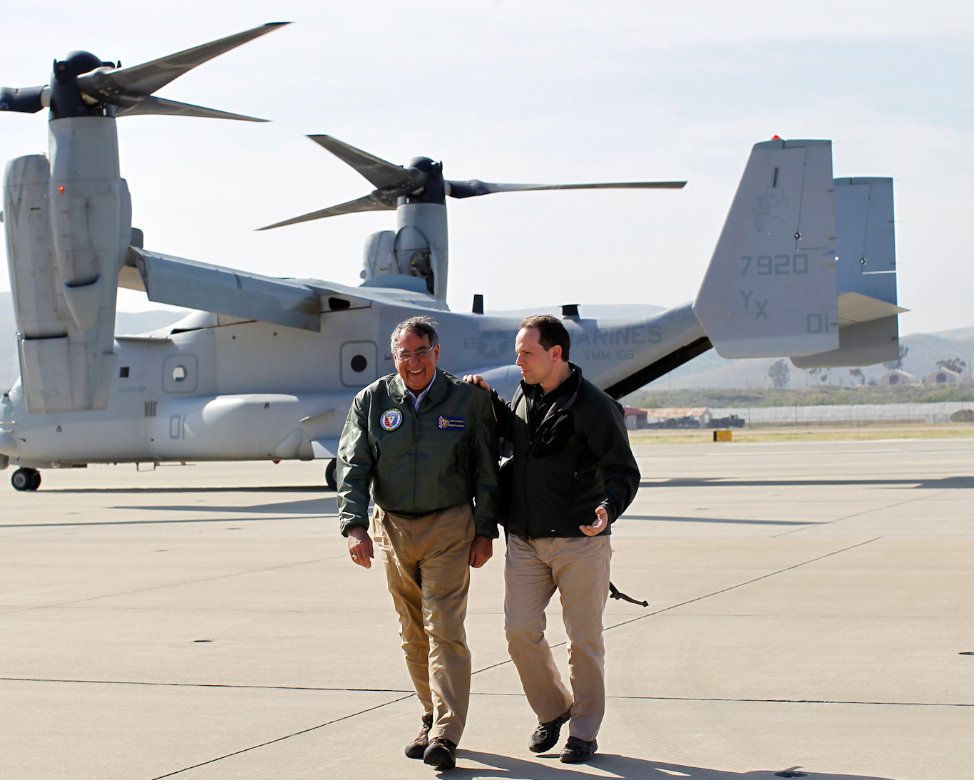 Jeremy Bash, left, head of Beacon,is pictured with former CIA Chief Leon Panetta at Camp Pendleton in 2012. Mike Blake | AP