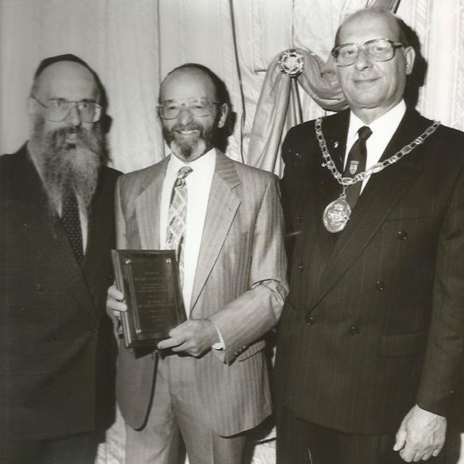 Arnold Berkley (center) with Rabbi Chaim Jacobs of the Glasgow Chabad-Lubavitch community. Photo | Archive