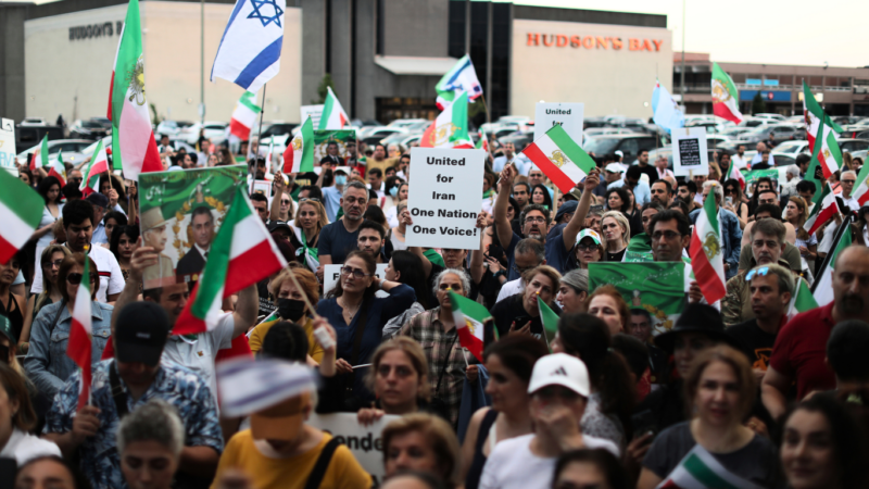 Iranian expats rally in Toronto on June 21, 2025, in support of exiled Crown Prince Reza Pahlavi following U.S. airstrikes on nuclear sites in Fordow, Natanz and Esfahan. Protesters waved pre-revolutionary flags and denounced the Islamic Republic. Sayed Najafizada | AP