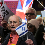 Pro-Israel demonstrators gather in London during a counter-protest to a pro-Palestinian rally, part of the wider mobilization that groups like Stop The Hate UK have sought to amplify as they pressure authorities to crack down on anti-genocide activism. (Photo by Martin Pope / SOPA Images/Sipa USA)(Sipa via AP Images)