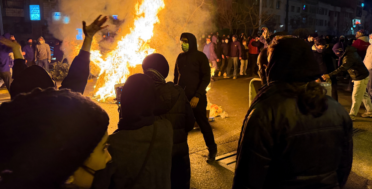 In this photo obtained by The Associated Press, Iranians attend an anti-government protest in Tehran, Iran, Friday, Jan. 9, 2026. (UGC via AP)